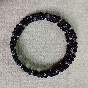 Silvertone black beaded wire bracelet